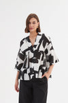 V Neck Peplum Top - Black Abstract Print